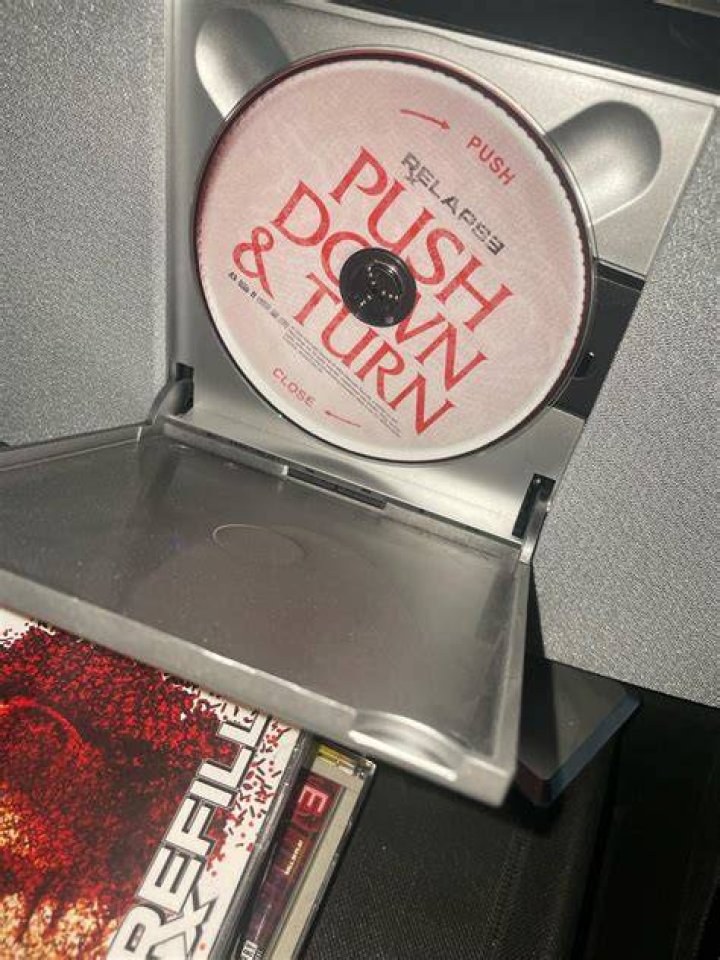 How do I get the second CD out of my case?