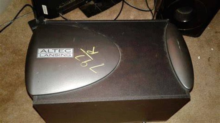 How do I hook up my Altec Lansing subwoofer?