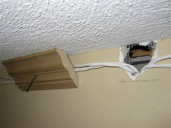 How do you hide speaker wire in crown molding?