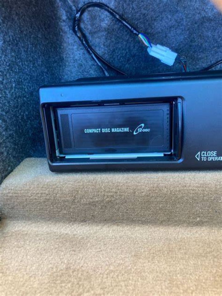 What happens when cartridge is stuck in CD changer?