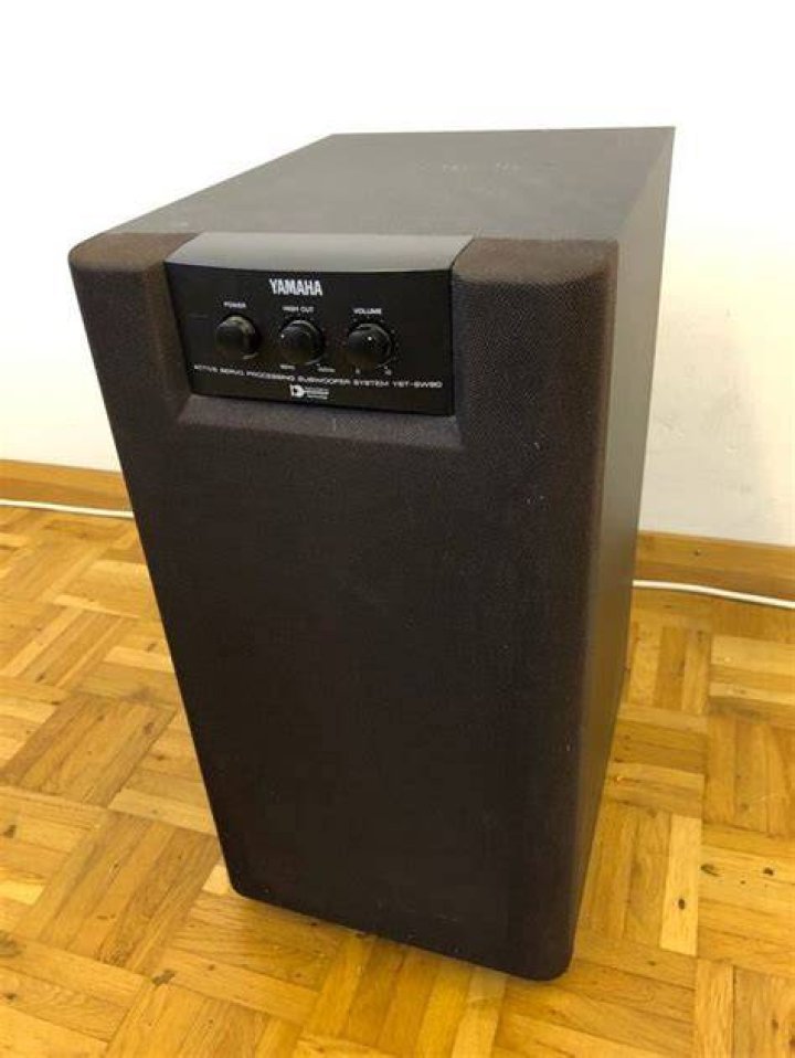 When did the Yamaha YST 100 subwoofer come out?
